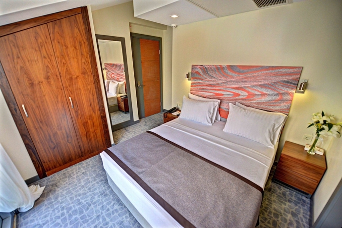 Imagen de la habitación del All Inn Hotel. Foto 10