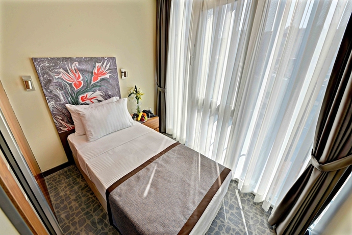 Imagen de la habitación del All Inn Hotel. Foto 11