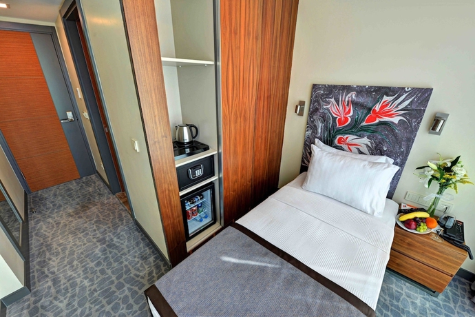 Imagen de la habitación del All Inn Hotel. Foto 12