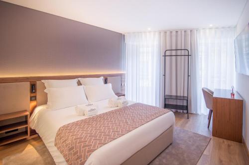 Imagen de la habitación del Alliança Suites 1909 - Porto. Foto 17