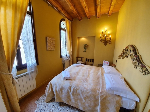 Imagen de la habitación del Alloggi Alla Rivetta. Foto 4