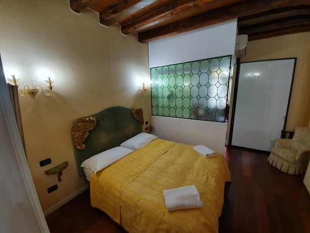 Imagen de la habitación del Alloggi Alla Rivetta. Foto 6