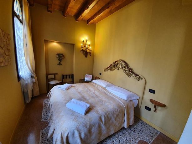 Imagen de la habitación del Alloggi Alla Rivetta. Foto 8