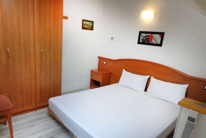 Imagen de la habitación del Alloggi al Verdi. Foto 15