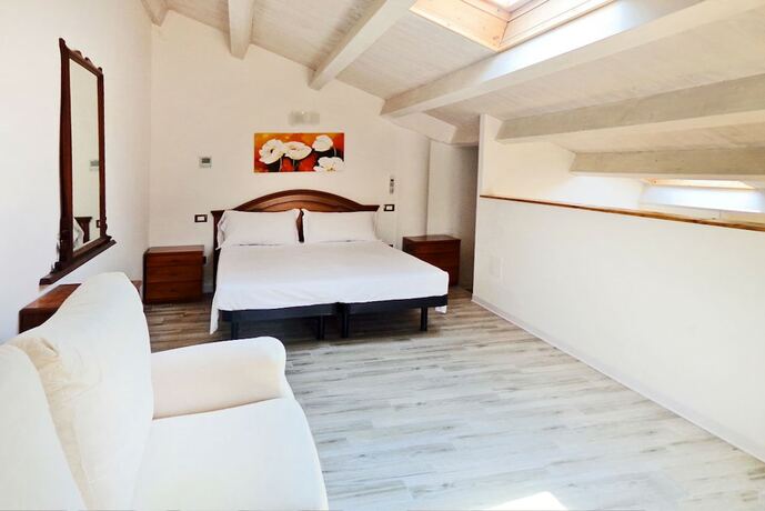 Imagen de la habitación del Alloggi al Verdi. Foto 20
