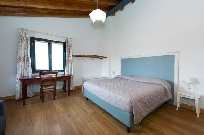 Imagen de la habitación del Alloggio Agrituristico Albafiorita. Foto 13