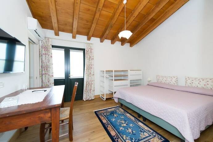 Imagen de la habitación del Alloggio Agrituristico Albafiorita. Foto 14