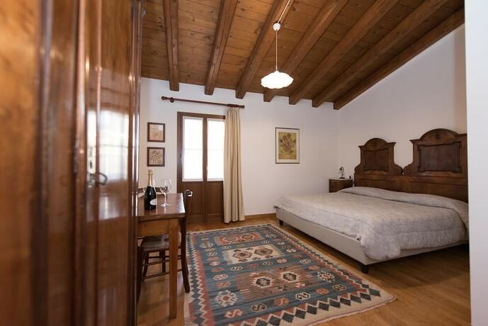 Imagen de la habitación del Alloggio Agrituristico Albafiorita. Foto 16