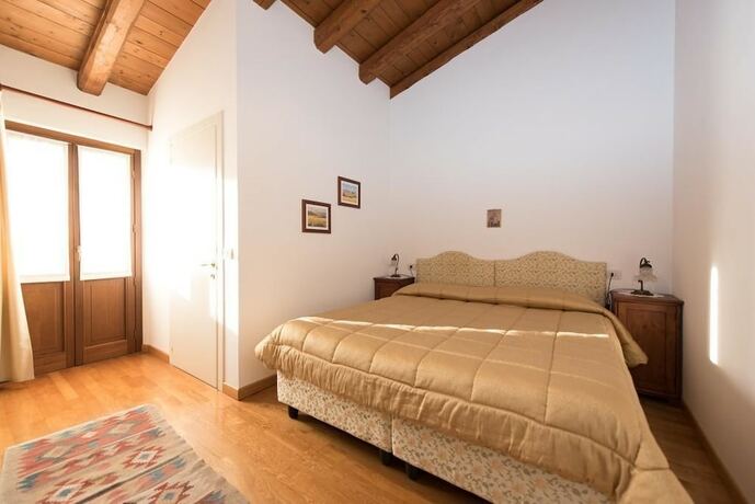 Imagen de la habitación del Alloggio Agrituristico Albafiorita. Foto 17