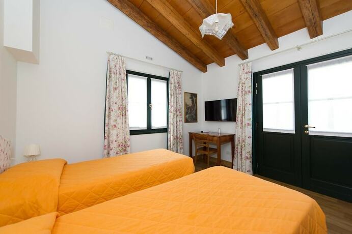 Imagen de la habitación del Alloggio Agrituristico Albafiorita. Foto 19