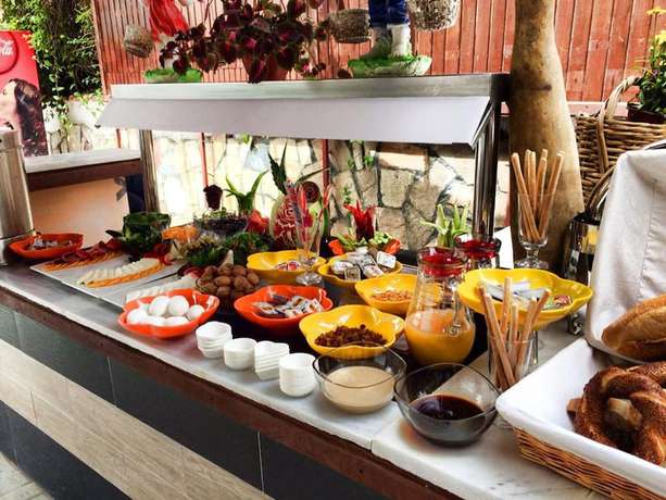 Imagen del bar/restaurante del Almila Side Suite Hotel. Foto 6