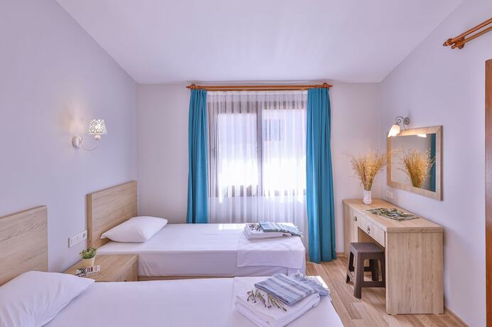 Imagen de la habitación del Almond Bungalow Hotel. Foto 15