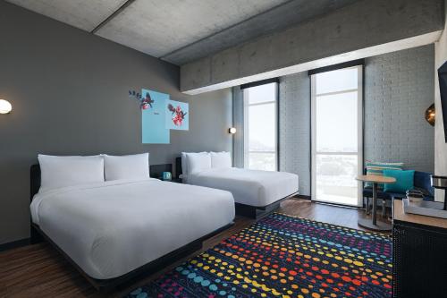 Imagen de la habitación del Aloft Guadalajara Sur. Foto 17