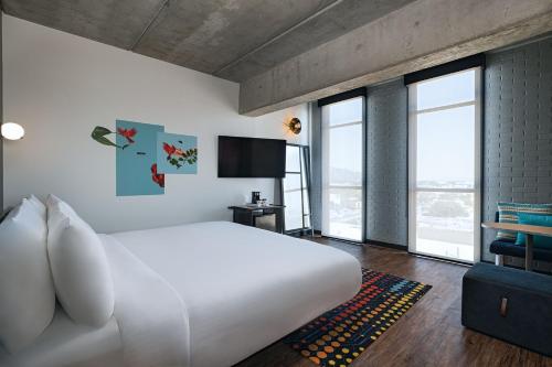 Imagen de la habitación del Aloft Guadalajara Sur. Foto 18