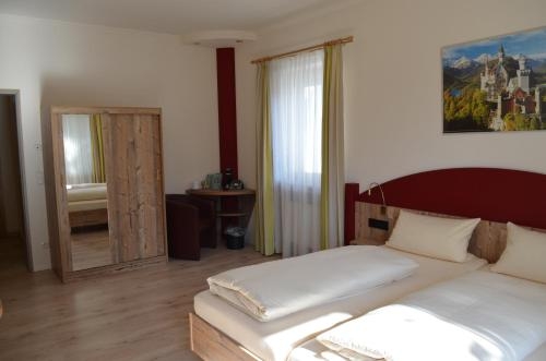 Imagen de la habitación del Alpchalet Schwanstein. Foto 9