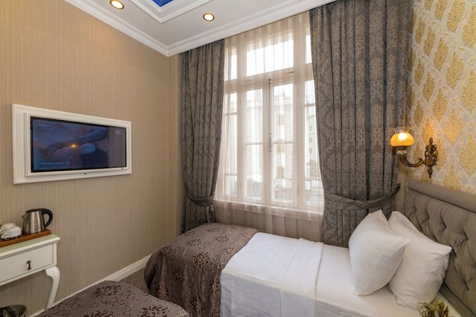 Imagen de la habitación del Alpek Hotel. Foto 14