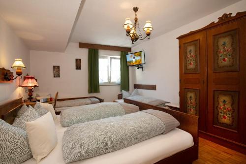 Imagen de la habitación del Alpen Hotel Martin. Foto 16