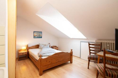 Imagen de la habitación del Alpen Hotel Martin. Foto 17