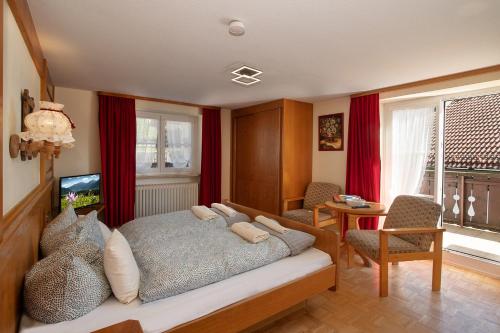 Imagen de la habitación del Alpen Hotel Martin. Foto 19