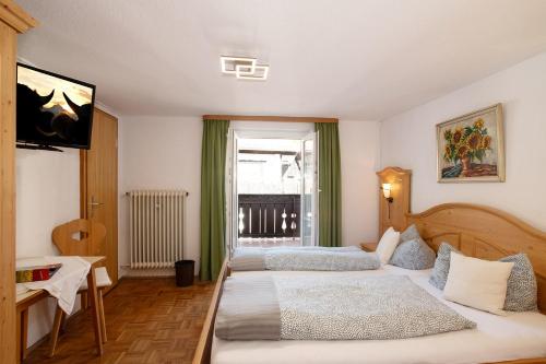 Imagen de la habitación del Alpen Hotel Martin. Foto 20