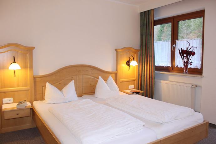 Imagen de la habitación del Alpenhotel L&auml;rchenhof. Foto 11
