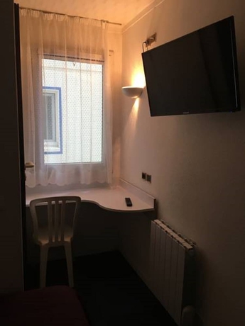 Imagen de la habitación del Alpha Hotel. Foto 9