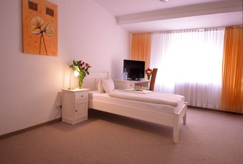 Imagen de la habitación del Alpha Hotel Garni, Dietzenbach. Foto 9