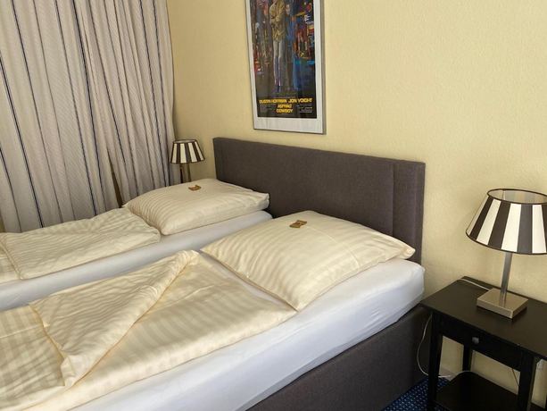 Imagen de la habitación del Alpha Hotel-Pension. Foto 19