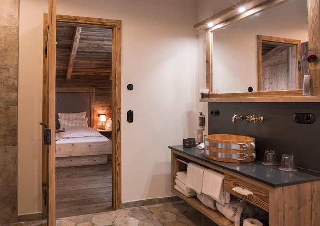 Imagen de la habitación del Alpin Chalets. Foto 5