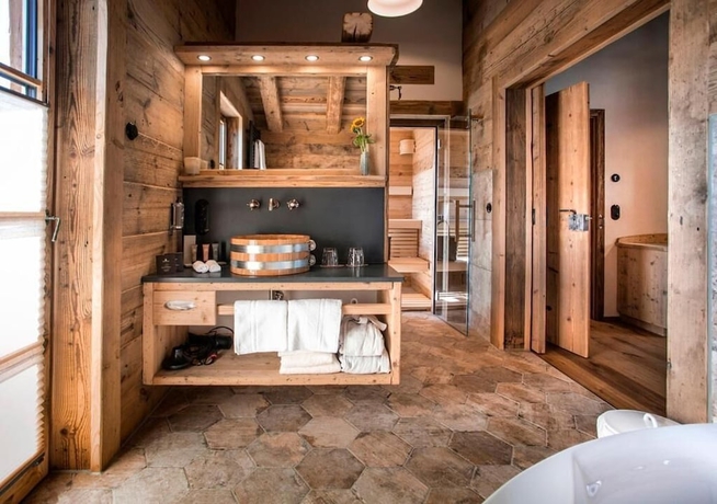 Imagen de la habitación del Alpin Chalets. Foto 11