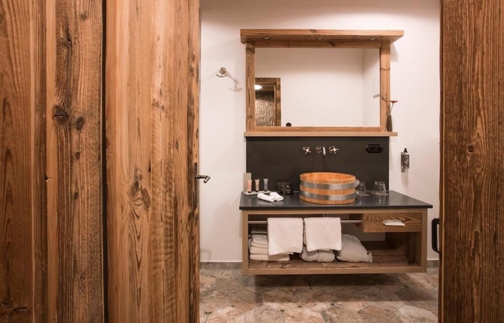 Imagen de la habitación del Alpin Chalets. Foto 14