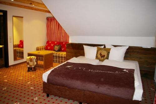 Imagen de la habitación del Alpin Lifestyle Hotel L&ouml;wen & Strauss. Foto 7
