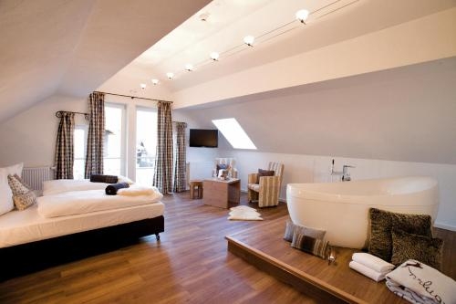 Imagen de la habitación del Alpin Lifestyle Hotel L&ouml;wen & Strauss. Foto 10