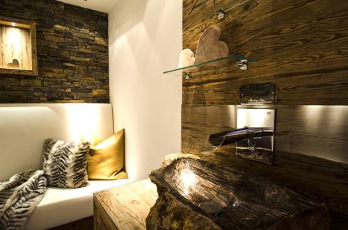 Imagen de la habitación del Alpinlounge R&auml;tia Appartements. Foto 4