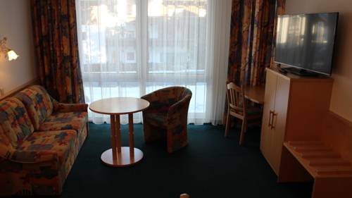 Imagen de la habitación del Alpinlounge R&auml;tia Appartements. Foto 5
