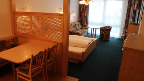 Imagen de la habitación del Alpinlounge R&auml;tia Appartements. Foto 7