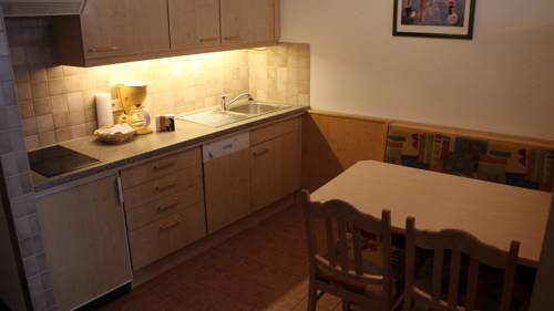 Imagen de la habitación del Alpinlounge R&auml;tia Appartements. Foto 8