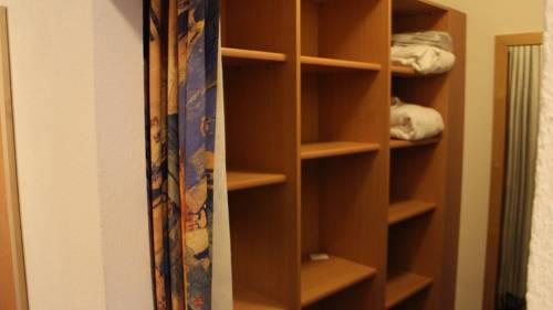 Imagen de la habitación del Alpinlounge R&auml;tia Appartements. Foto 9