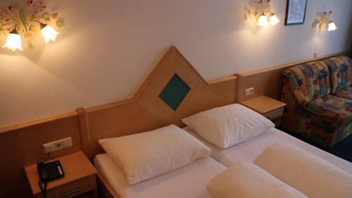 Imagen de la habitación del Alpinlounge R&auml;tia Appartements. Foto 12