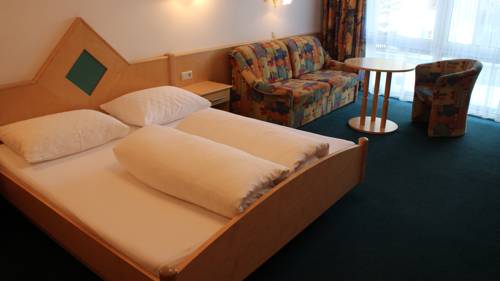 Imagen de la habitación del Alpinlounge R&auml;tia Appartements. Foto 13