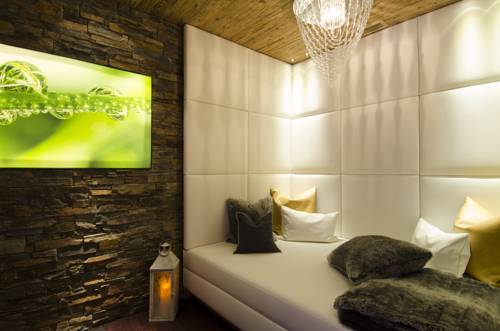 Imagen de la habitación del Alpinlounge R&auml;tia Appartements. Foto 16