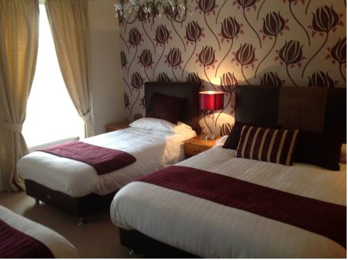Imagen de la habitación del Alston House Hotel. Foto 9