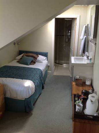 Imagen de la habitación del Alston House Hotel. Foto 11
