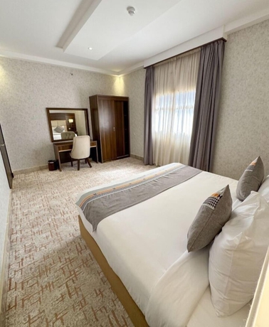 Imagen de la habitación del Alufq Hotel Suites. Foto 2