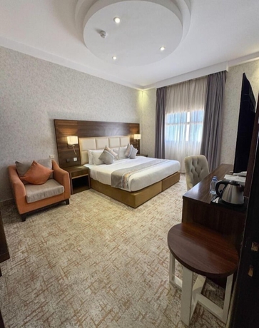 Imagen de la habitación del Alufq Hotel Suites. Foto 6