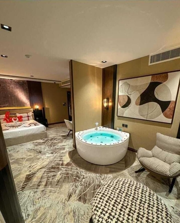 Imagen de la habitación del Alufq Hotel Suites. Foto 8