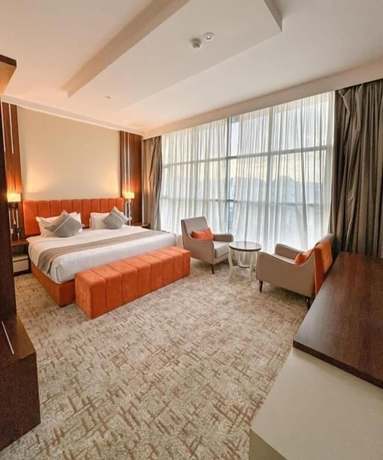 Imagen de la habitación del Alufq Hotel Suites. Foto 10
