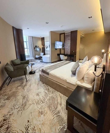 Imagen de la habitación del Alufq Hotel Suites. Foto 11