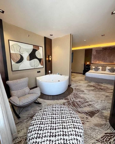 Imagen de la habitación del Alufq Hotel Suites. Foto 12