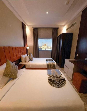 Imagen de la habitación del Alufq Hotel Suites. Foto 14